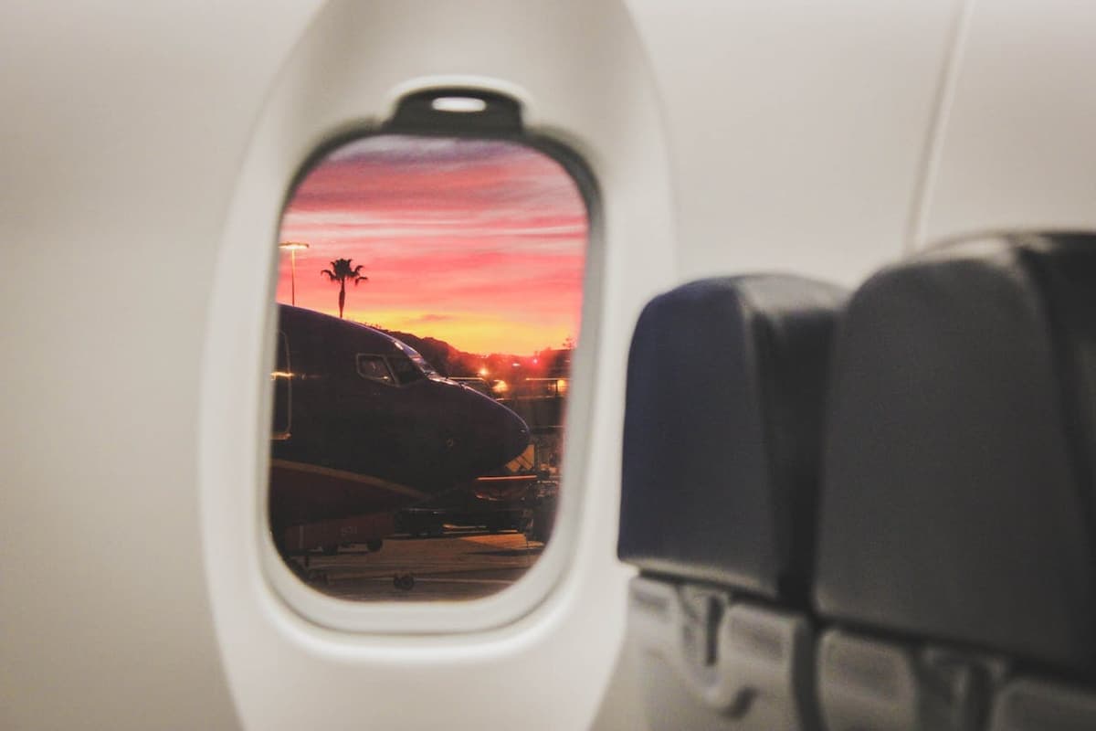 Sunrise on the apron, seen from an aircraft window