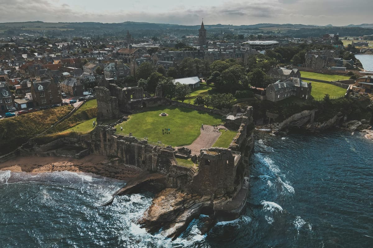 St Andrews Castle on the cliff edge, looking along the coast